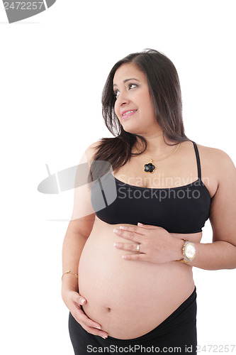 Image of Happy pregnant woman looking away, isolated on white background