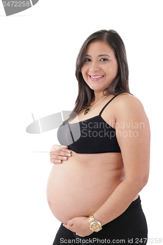 Image of Young pregnant woman smiling at camera against white background 