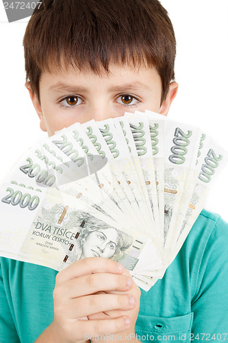 Image of boy holding a fan from czech crown banknotes