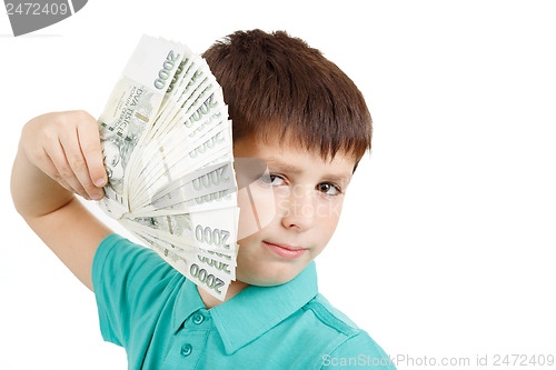 Image of boy holding a fan from czech crown banknotes