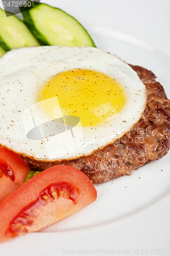 Image of steak beef meat with fried egg