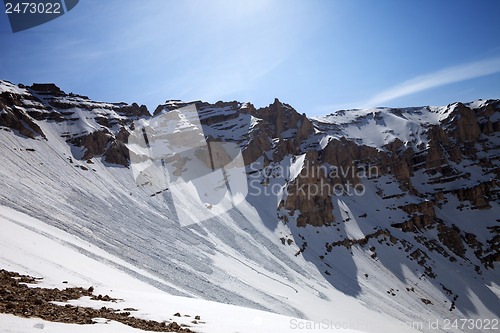 Image of Snowy mountains with trace of avalanche