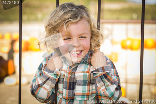 Image of Little Boy Playing at the Park