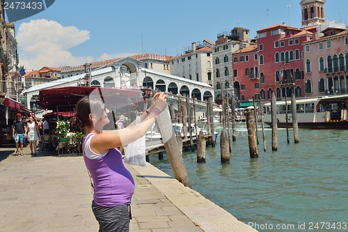 Image of tourist woman have beautoful vacation time in venice