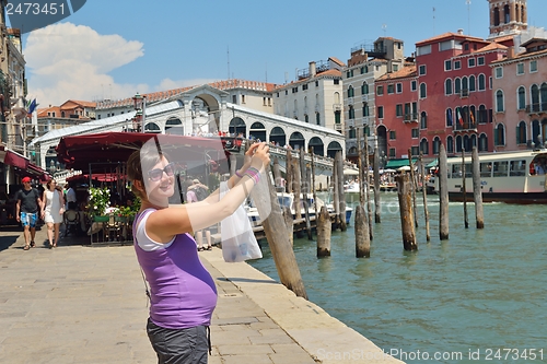 Image of tourist woman have beautoful vacation time in venice