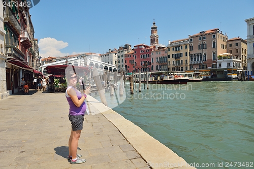 Image of tourist woman have beautoful vacation time in venice