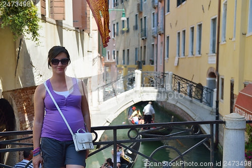 Image of tourist woman have beautoful vacation time in venice