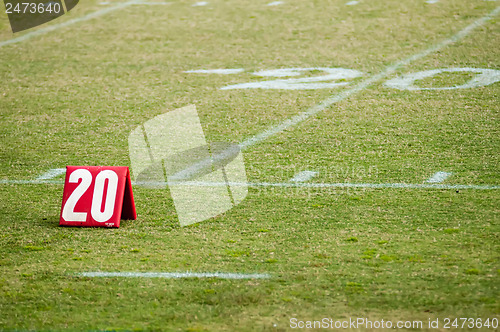 Image of football field 20 twenty yard line marker
