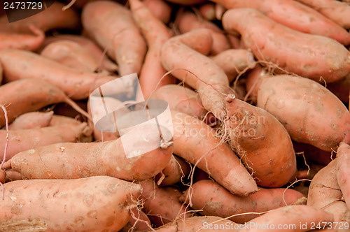 Image of sweet potatoes on a farm display