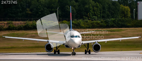 Image of airplane front close-up view airfield ground day time