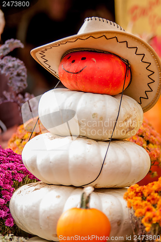 Image of adorable cowboy pumpkin figures made from pumpkins