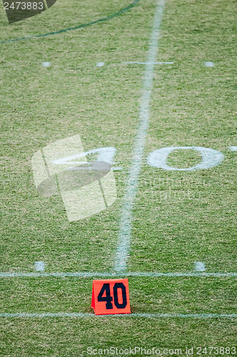 Image of football field 40 twenty yard line marker
