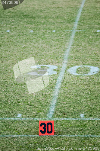 Image of football field 30 twenty yard line marker
