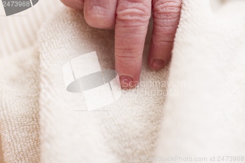 Image of hand of new born baby in close up