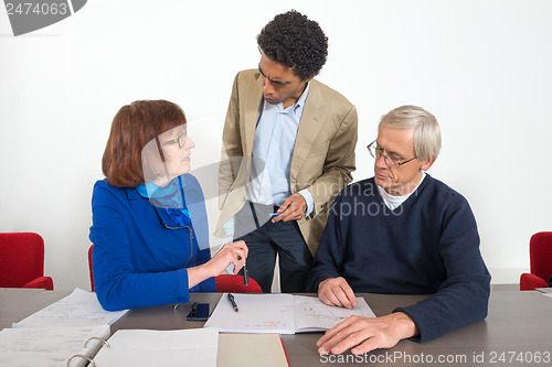 Image of Business people talking in office