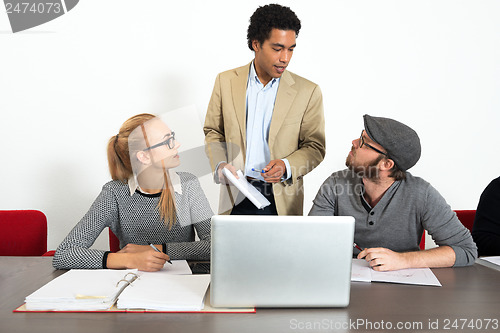 Image of Business people talking in office
