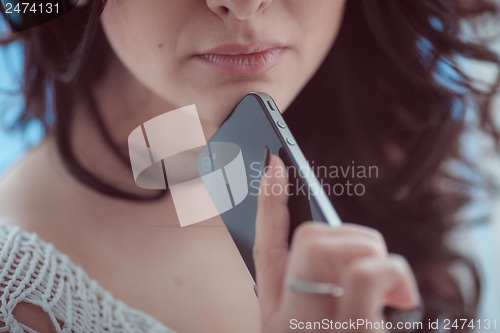 Image of woman with phone