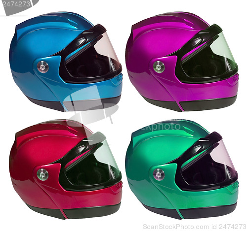 Image of Motorcycle helmets on a white background in different colors. Co