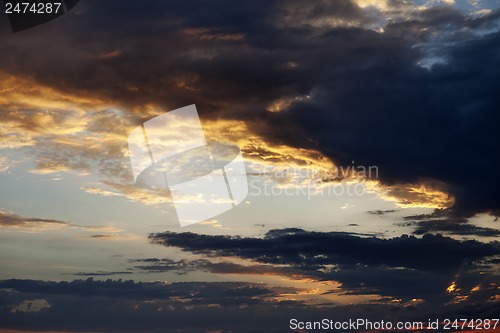 Image of Fiery sunset sky on summer sea