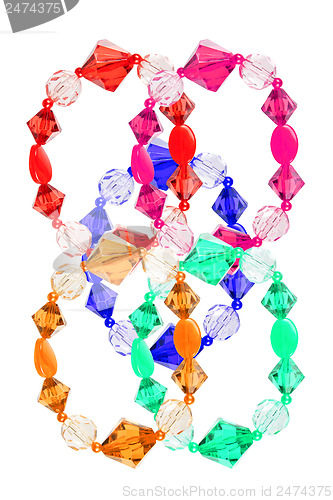 Image of Bracelets made of glass on a white background. Collage