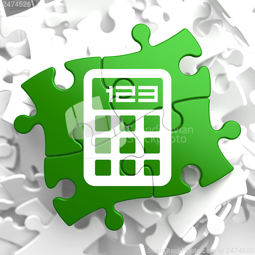 Image of Calculator Icon on Green Puzzle.