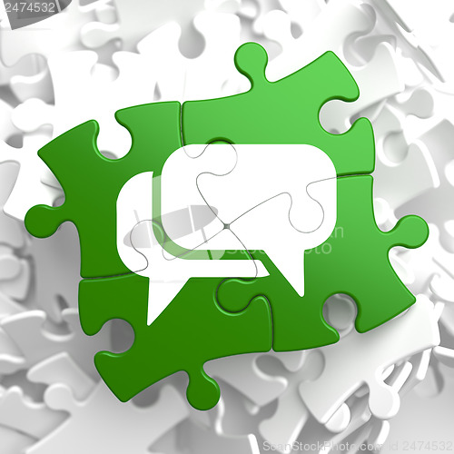 Image of White Speech Bubble Icon on Green Puzzle.