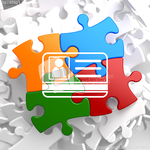 Image of ID Card Icon on Multicolor Puzzle.