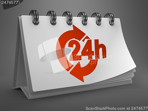 Image of Desktop Calendar with Red 24 Hours Icon.
