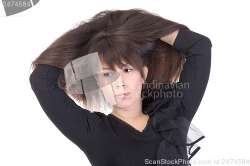 Image of Attractive young woman with lovely long hair