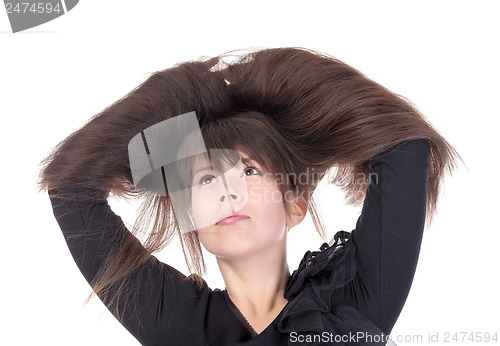 Image of Attractive young woman with lovely long hair