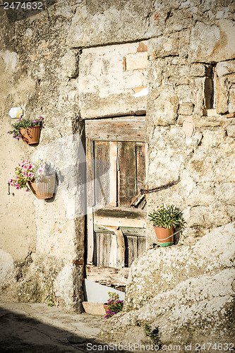 Image of door with wall in tuscany