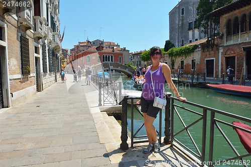 Image of tourist woman have beautoful vacation time in venice