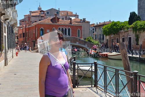 Image of tourist woman have beautoful vacation time in venice