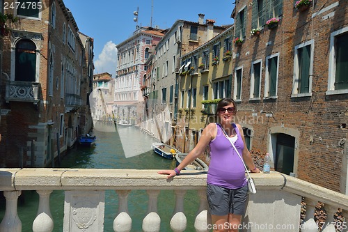 Image of tourist woman have beautoful vacation time in venice