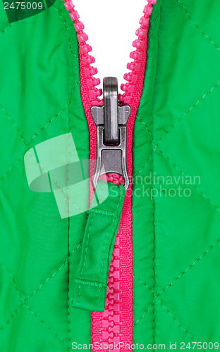 Image of pink zipper on the green jacket