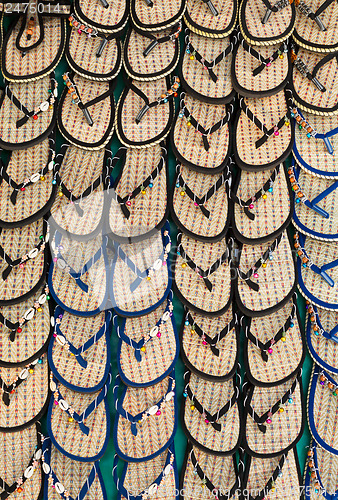 Image of straw flip flops