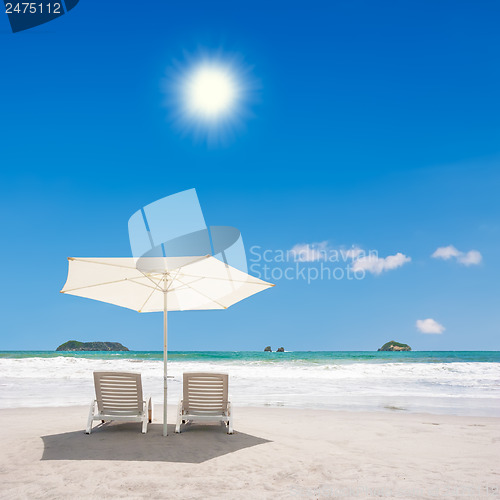 Image of Two Chairs at the Beach