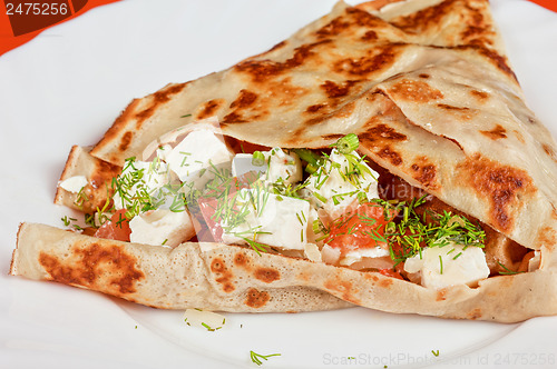 Image of pancakes with cheese and vegetables