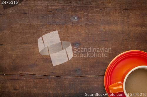 Image of coffee on a grunge wooden table