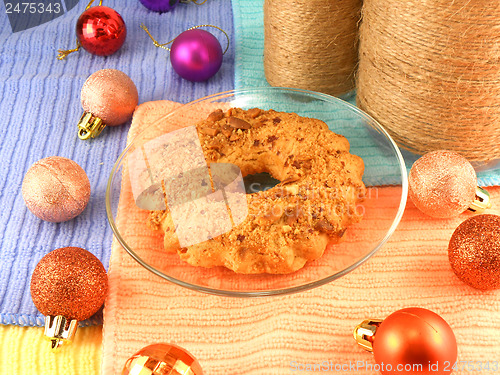 Image of Christmas cake with vintage bottle and christmas balls