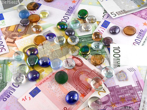 Image of stones set on euro money background