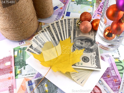 Image of money wallpaper, maple leaves and christmas balls, new year celebration event