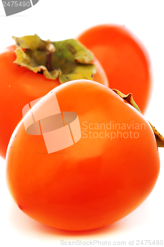 Image of Ripe persimmon closeup. 