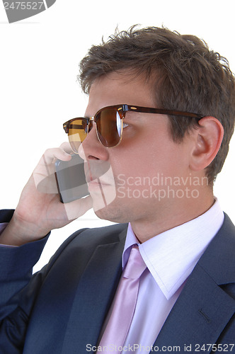 Image of Man on cell phone.