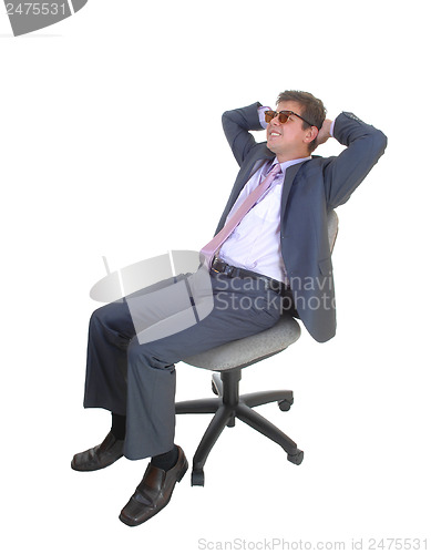 Image of Happy businessman sitting.