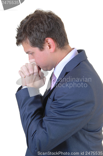 Image of Praying businessman.