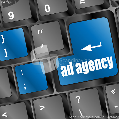 Image of Advertising concept: computer keyboard with word Ad Agency