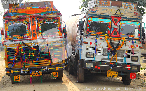 Image of ornate trucks in india