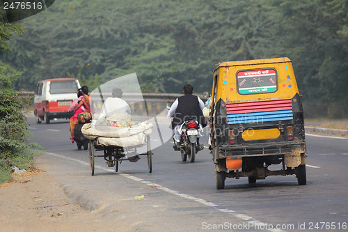 Image of variety of vehicles on indian road