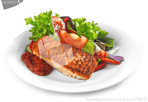 Image of Grilled salmon fillet and vegetable salad